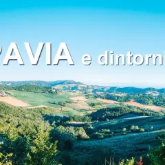 Colline verdi e campi coltivati sotto un cielo azzurro, con il testo "PAVIA e dintorni" che sovrasta il paesaggio.