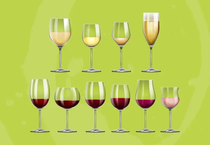 Diversi bicchieri di vino bianco e rosso, con un calice di spumante. Ideale per capire la temperatura vini bianchi perfetta.