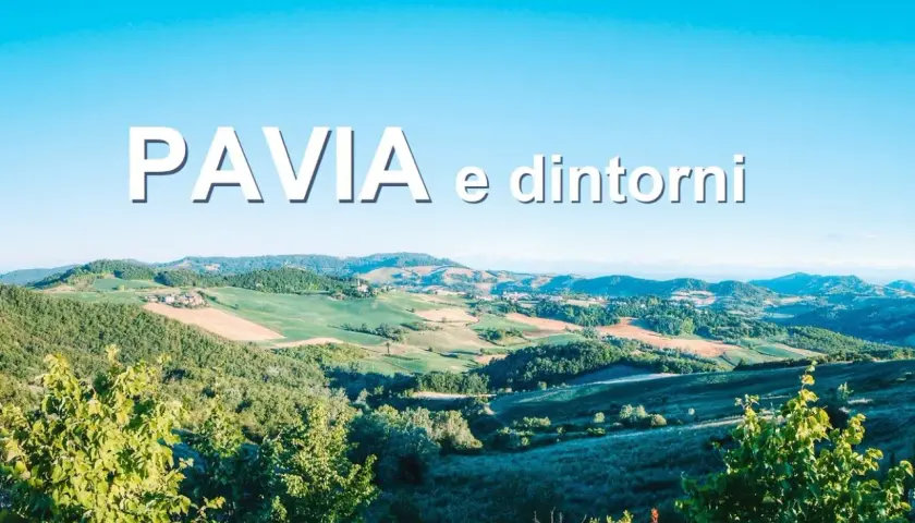 Colline verdi e campi coltivati sotto un cielo azzurro, con il testo "PAVIA e dintorni" che sovrasta il paesaggio.