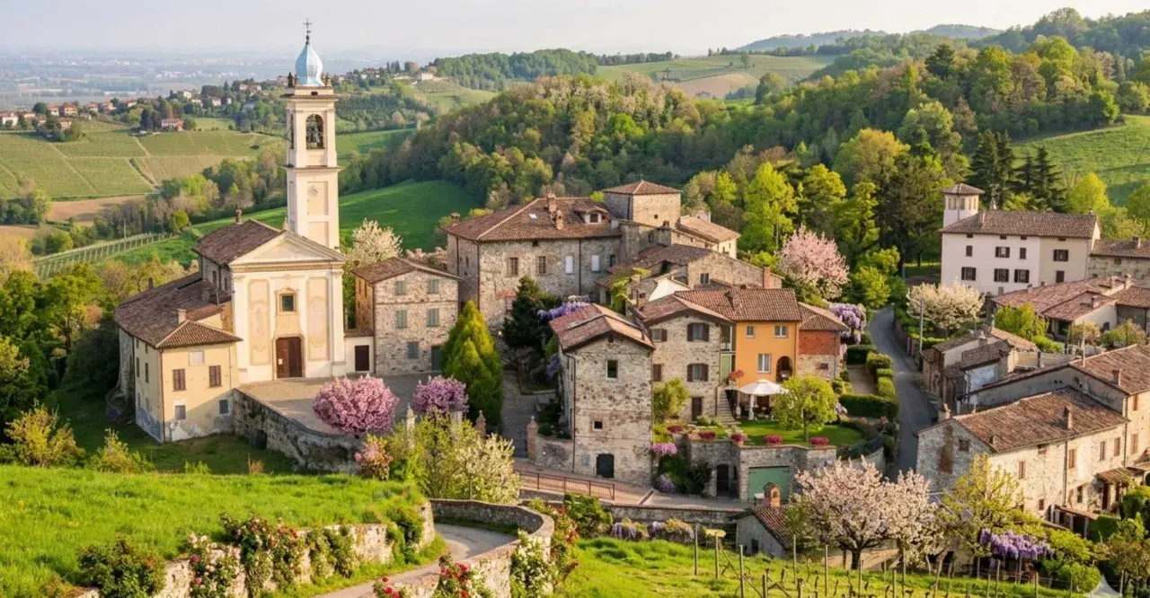 Borgo pittoresco con chiesa e campanile, colline verdi e fiori in primavera. Un luogo incantevole da scoprire, un vero gioiello per chi cerca cosa vedere a Golferenzo.